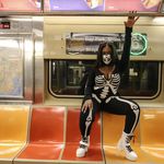 Photos of people dressed up in costumes on the subway for Halloween 2020